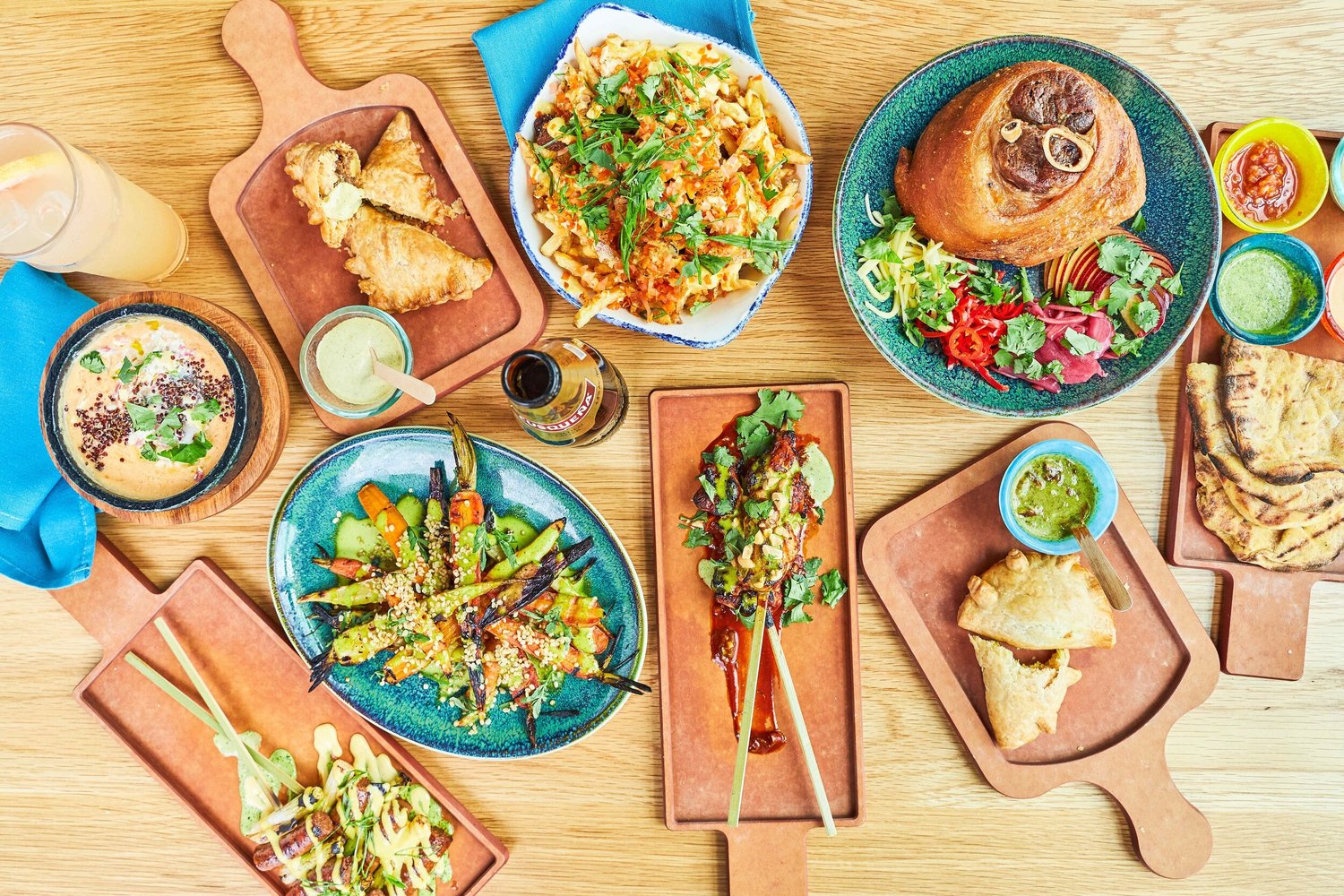 Platters of colourful food on a table in Cabra shot from above