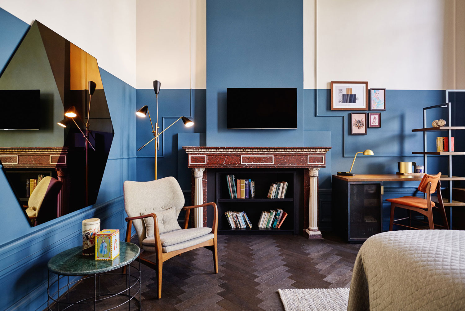 Chair and fake fireplace in hotel room