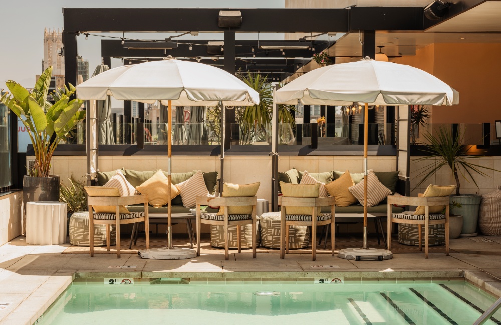 Rooftop with four cabanas by the pool at The Hoxton, DTLA