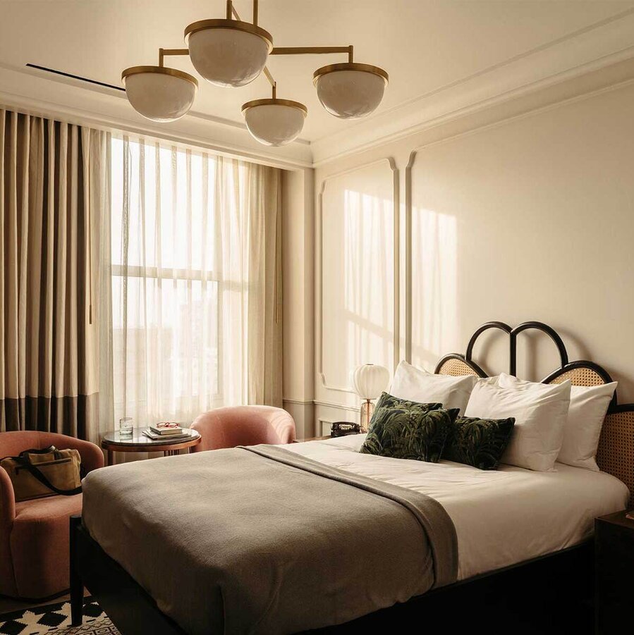 Bedroom at The Hoxton, DTLA with natural light streaming through the window