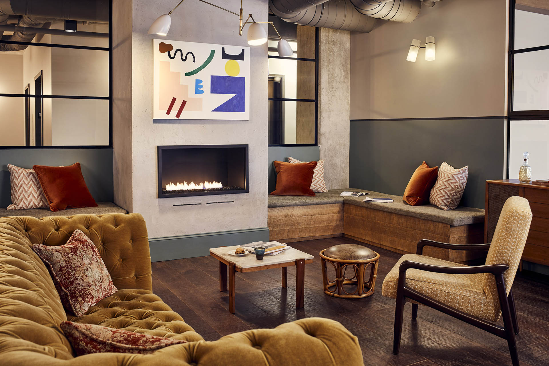 Lounge area with comfortable seating around a fireplace