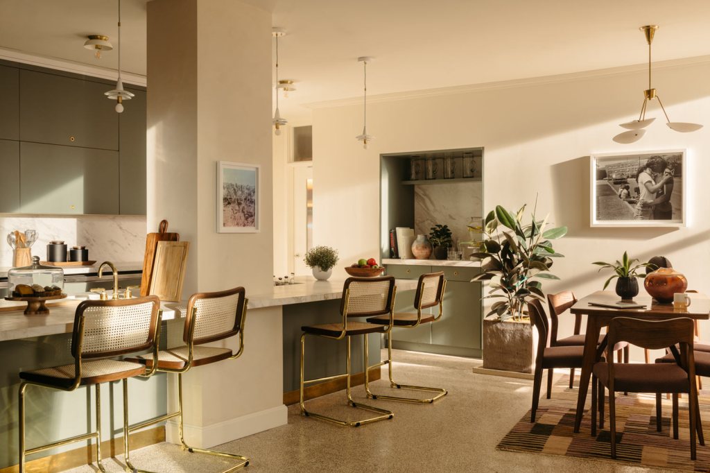 The kitchen pantry is a shared space with help-yourself snacks and a variety of seating to relax in between meetings