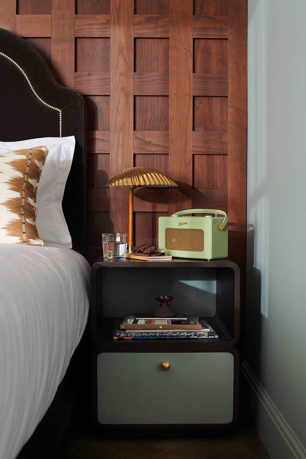 Beside table with Roberts radio and lamp in Rome hotel