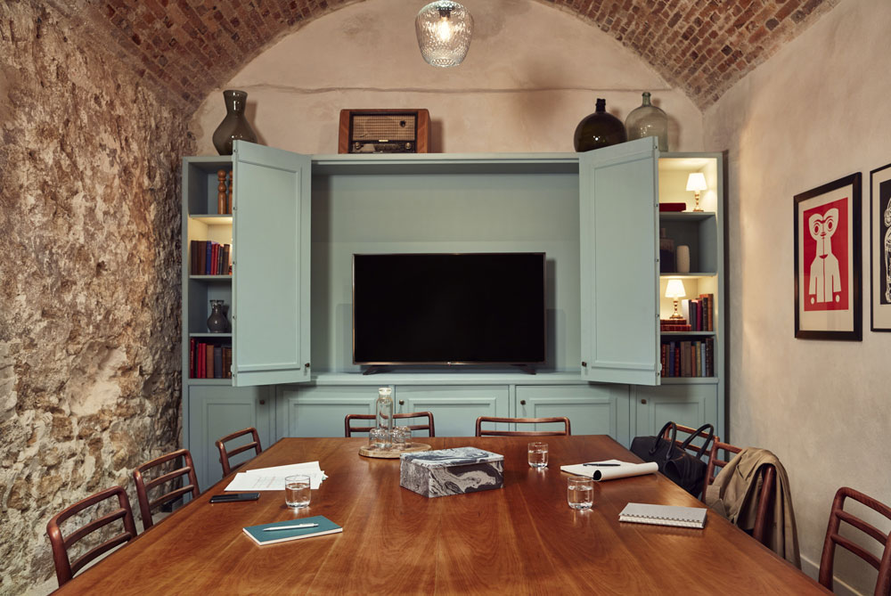 La Planque meeting room in Paris showing the TV