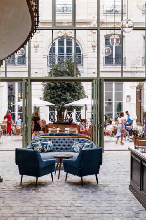 Lobby area and courtyard in The Hoxton, Paris