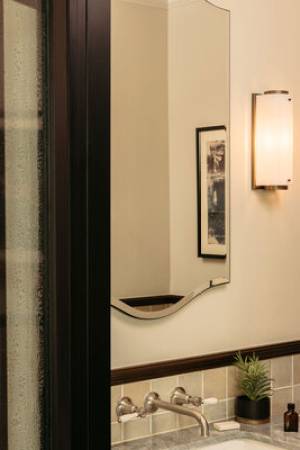 Mirror above sink in hotel bathroom in DTLA hotel