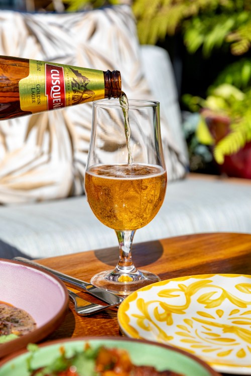 Refreshing beer being poured into a glass.