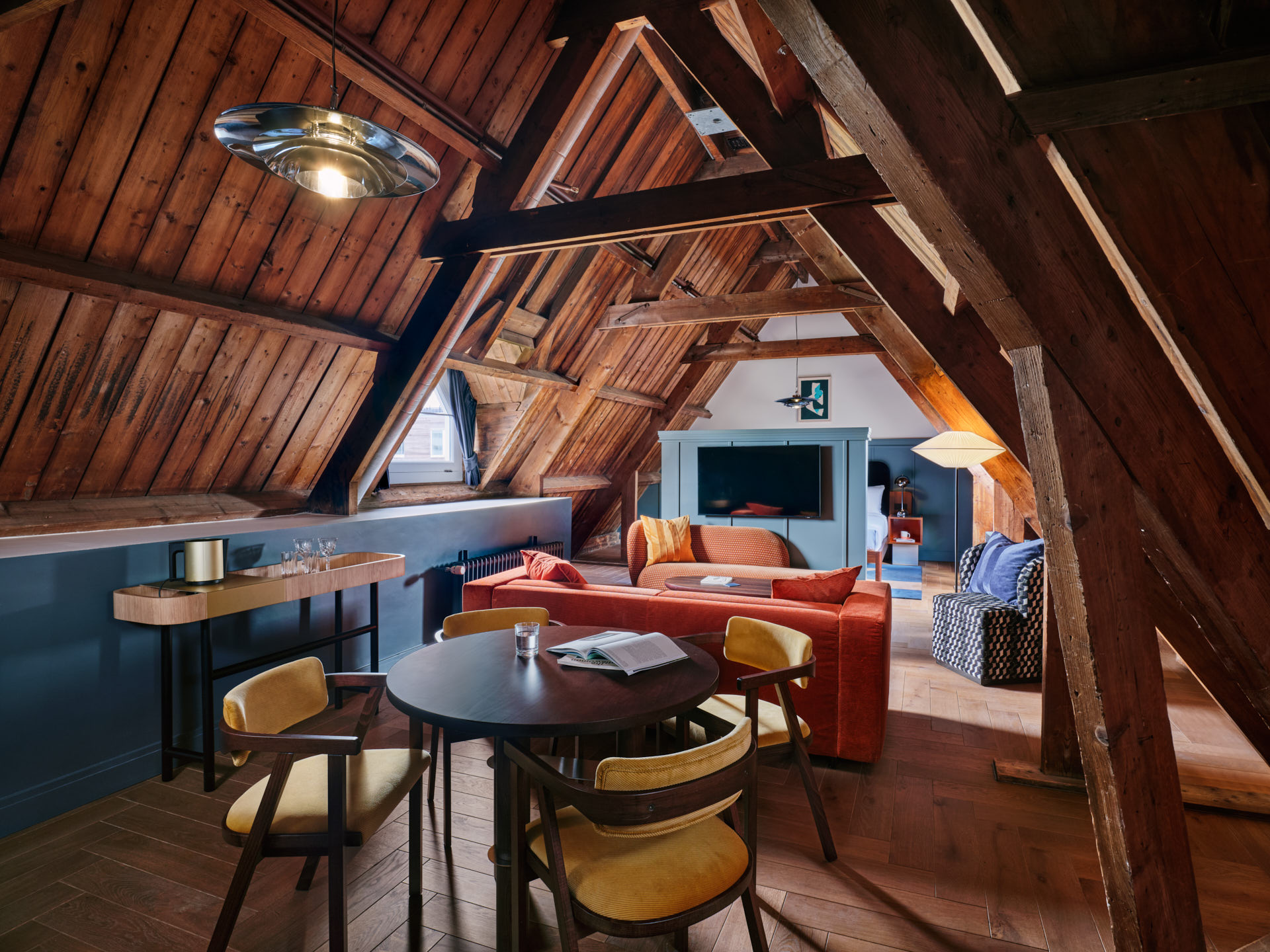 Wide view of Studio room with polished wood ceiling and plenty of cosy space
