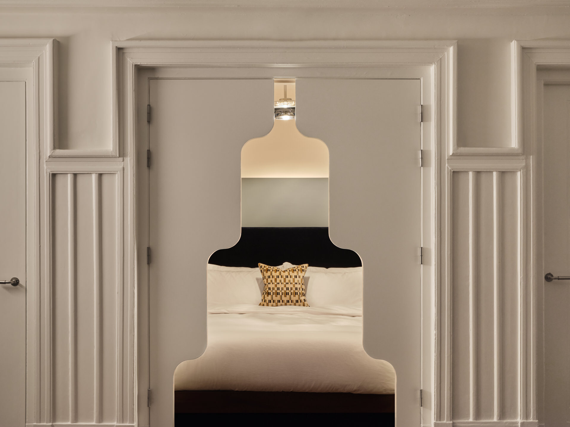 View through shutters into the corner bed.