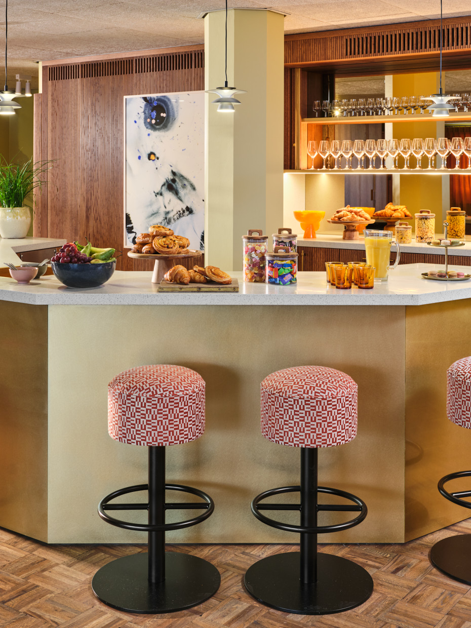 Lloyd pantry with pink stools and counter with fresh fruit