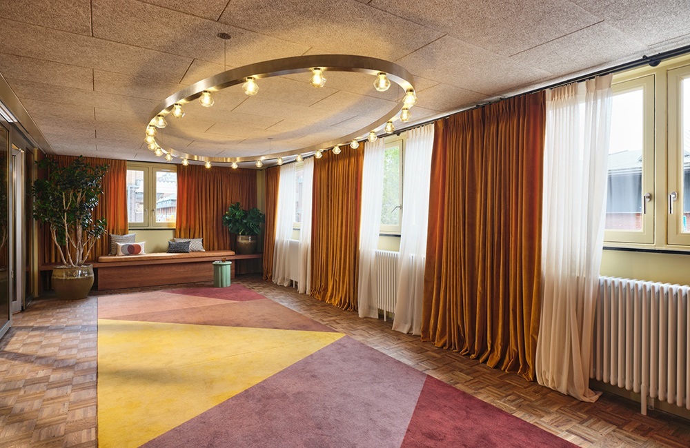 Dining room space with furniture removed to create standing space for cocktail party