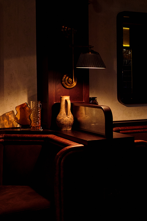 Dim lit bar booth.