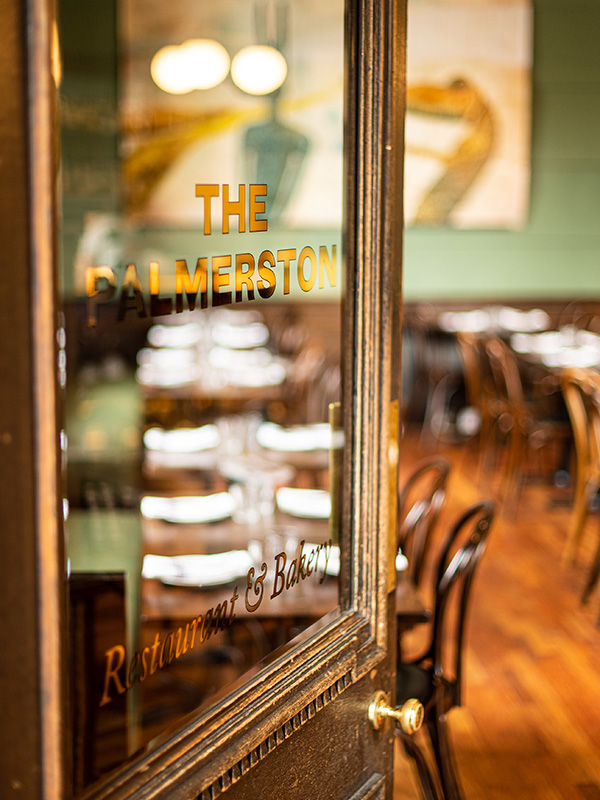 The door to the Palmerston restaurant shows into the interior.