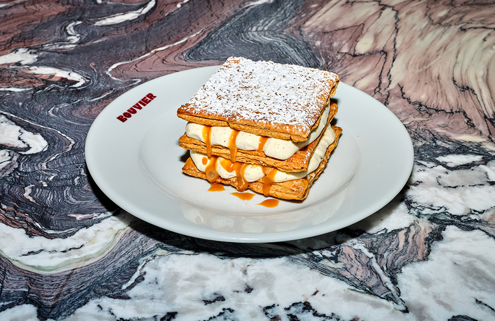 puff pastry layer filled with cream and caramel sauce.