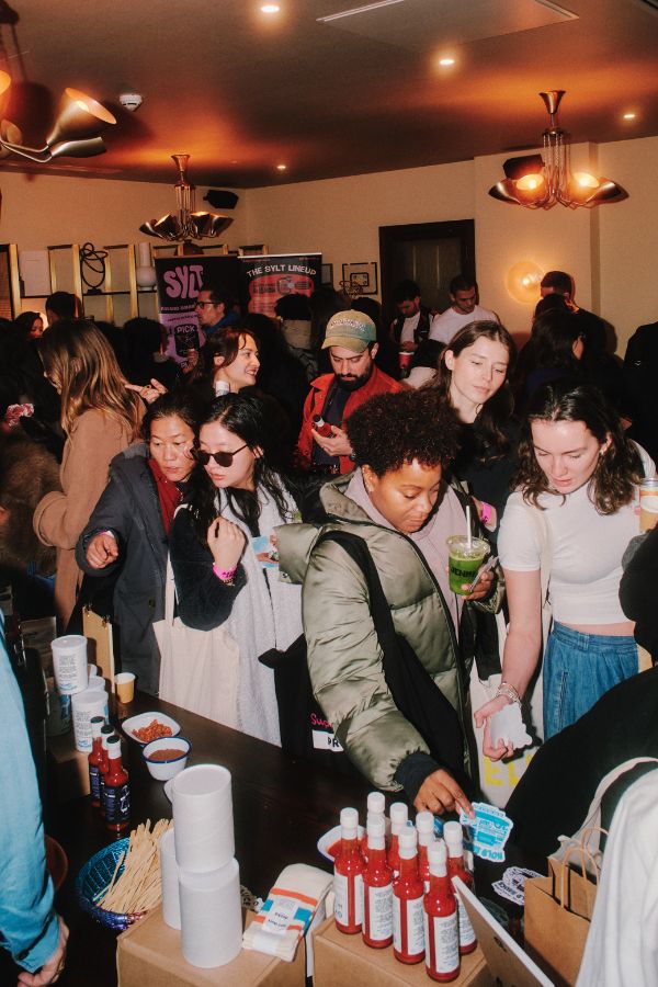 A massive crowd of people at the gut event.