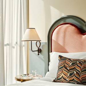 Room of The Hoxton Berlin Roomy up with big windows.