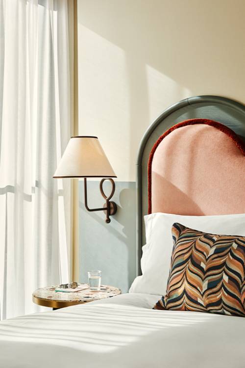 Room of The Hoxton Berlin Roomy up with big windows.