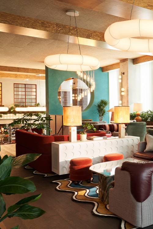 The Hoxton Brussels Lower ground lobby with colour interior design and tons of natural light.